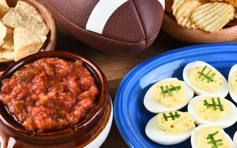 Table full of big game snacks.